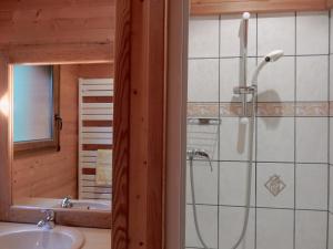 a bathroom with a shower and a sink at Chalet in Vosges Forest with Valley View in La Bresse +32 photos