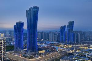 a view of a city with tall skyscrapers at Courtyard by Marriott Yibin in Yibin