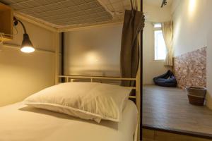 Posteľ alebo postele v izbe v ubytovaní Sleeping Boot Hostel