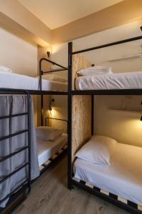 Posteľ alebo postele v izbe v ubytovaní Sleeping Boot Hostel