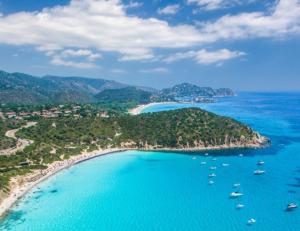 an aerial view of a beach with boats in the water at B&B Villa Desy in Quartu SantʼElena