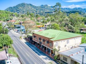 an aerial view of a town with a mountain at Hotel La Casa de la Abuela in Boquete