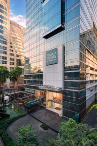 a building with a sign on the side of it at Four Points by Sheraton Bangkok Ploenchit Sukhumvit in Bangkok +145 photos