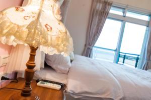 Voodi või voodid majutusasutuse Lantein B&B toas