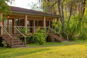 a house with stairs leading to the front of it at Sedia Hotel in Maun