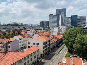 an overhead view of a city with tall buildings at Amrise Hotel Kitchener in Singapore