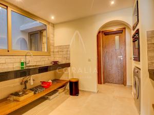a kitchen with a sink and a counter top at Illy - Ocean by Coralia - 4 Px in Taghazout