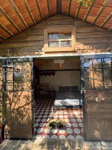 an inside of a house with a bed in it at The Forester Chalet in Buôn Pưk Prong