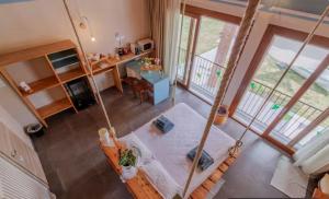 an overhead view of a living room with a table at B&B La barca ant al prà in Cuneo