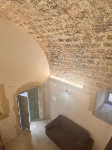 an overhead view of a room with a stone ceiling at Nonna Pia in Noto