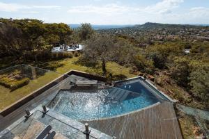 an overhead view of a swimming pool on a house at Castle View in Pretoria