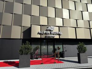 a red carpet in front of aadium royal casino at Alpin Royal in Schaan