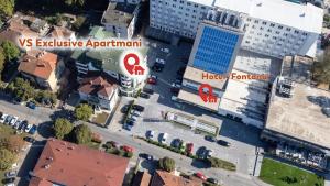 an aerial view of a city street with buildings at VS Exclusive Luxury Wellness & Spa Apartmani - Vrnjačka Banja in Vrnjačka Banja