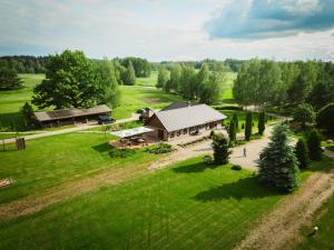 an aerial view of a farm with a building at Hämsa Maheresto & Heaolukeskus in Võru