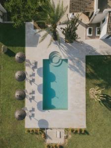 an aerial view of a pool in a yard at Vino Resort Son Amaret in Son Macia