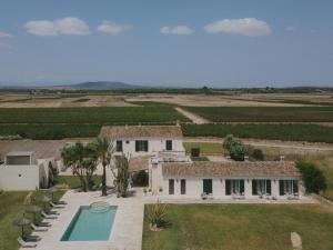 an aerial view of a house with a swimming pool at Vino Resort Son Amaret in Son Macia