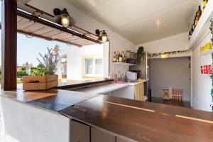 a kitchen with a counter top in a room at Quinta Sao Martinho in Reguengo Grande