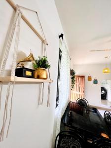 a living room with a shelf on the wall at A La Mer - Solis 3 in Varca