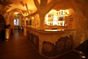 a bar in a wine tasting room with a counter at Hotel Paris in Düsseldorf