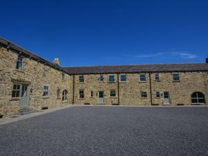 a large brick building with a large parking lot at 2 Bed in Consett oc-smidc in Lanchester