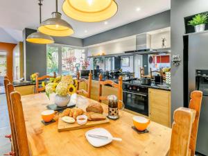 a kitchen with a wooden table with food on it at 2 Bed in Bradford oc-75164 in Thornton