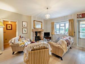 a living room with two couches and a fireplace at 2 Bed in Richmond oc-74305 in Barton