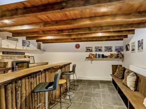 a bar in a restaurant with wooden beams at 3 Bed in Cornhill -on- Tweed oc-76374 in Carham