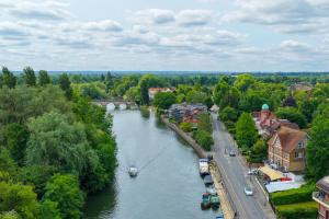 an aerial view of a river in a town at Uno Thames Hotel -Reopened Brand New Again -FREE PARKING in Maidenhead