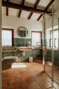 a bathroom with a toilet and a sink at Il Paliarete in Orvieto