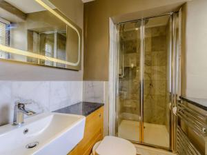 a bathroom with a sink and a shower at 5 Bed in Harrogate oc-83663 in Summer Bridge +19 photos