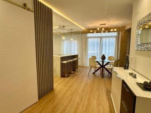 a large room with a kitchen and a dining room at MUNDAKA Centre 2 in Mundaka +2 photos