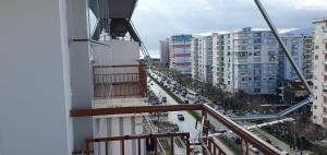 a balcony with a view of a city at Apartament martin 3 in Vlorë +1 photo