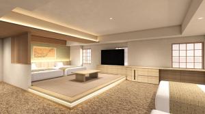 a hotel room with a bed and a flat screen tv at Daiwa Roynet Hotel Ginza PREMIER in Tokyo