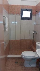 Koupelna v ubytování Tasos Rooms