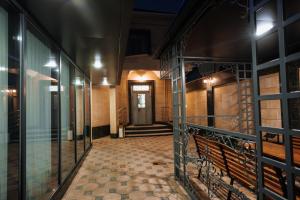 an empty hallway with a door in a building at Азия Hostel in Shymkent