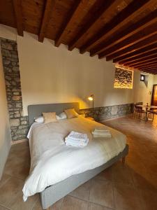 a bedroom with a large bed in a room at Vittoria in Brescia