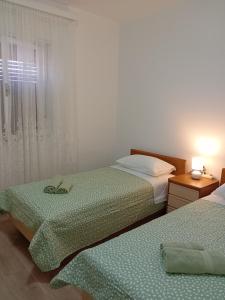 Krevet ili kreveti u jedinici u okviru objekta Apartman Francesca