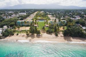 an aerial view of the beach at the resort at Beachfront Aquatika Resort- Style-Pools & Ocean in Rio Grande