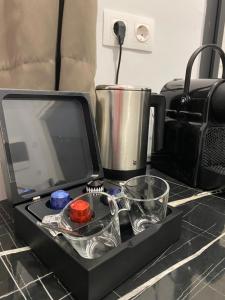 a black box sitting on top of a counter at Astradeni Suite in Nea Potidaea