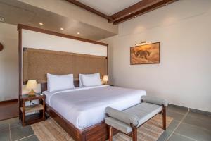 a bedroom with a large white bed in a room at Vanthra Vilas, Jawai - Luxury Villas with Private Pools in Bijāpur +85 photos