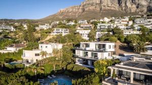 an aerial view of a city with houses and mountains at Sovn Boutique Hotel in Cape Town