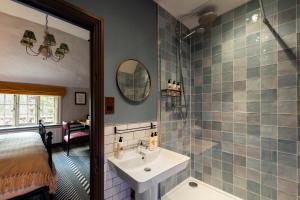 a bathroom with a sink and a shower at Bull Inn in Reading +77 photos