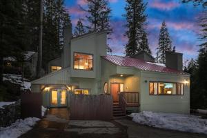 a house at night with the lights on at Yosemite Spirit in Yosemite West