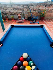a pool table with balls on top of it at CASA DE LOURDES - LA CANDELARIA in Bogotá