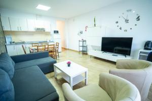 a living room with a couch and chairs and a table at Edificio Prieto VIV 2E in Puerto del Rosario