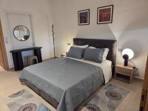 Llit o llits en una habitació de Karatza's suite