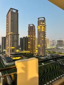 a view of a city skyline with tall buildings at Dream heaven in Greater Noida