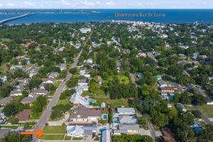 an aerial view of a neighborhood with houses and the water at Suite - Knome Dome with Shared Pool in Bay Saint Louis
