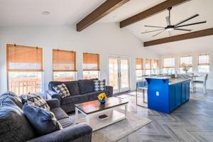 a living room with couches and a table at 6 Bedroom, 3 unit Triplex in Crystal Beach in Port Bolivar