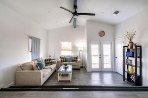 a living room with a couch and a table at 6 Bedroom, 3 unit Triplex in Crystal Beach in Port Bolivar